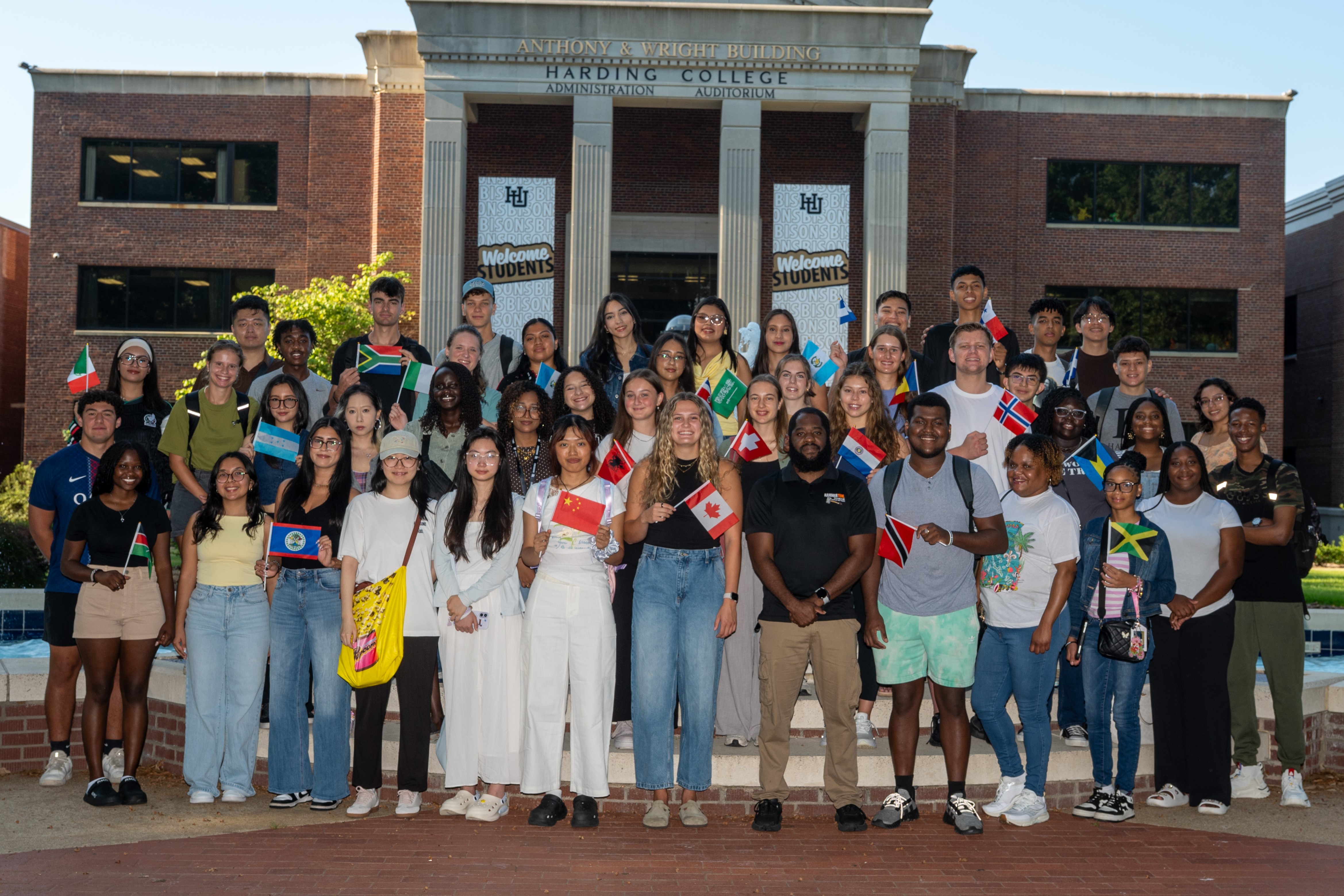 Students in front of the Admin building on campus