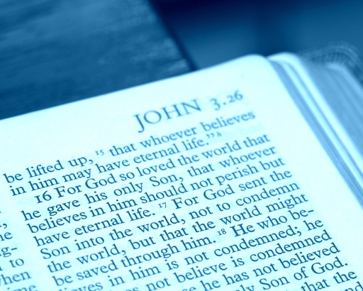 Open bible focused on John 3:16