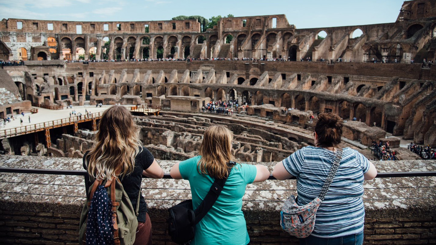 Students looking at the Colosseum in Rome