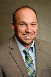 Headshot of Adam Baker