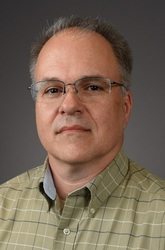Headshot of Eric Bond