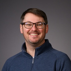 Headshot of Marcus Binns