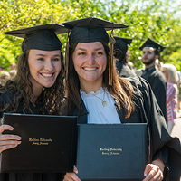 Two students after graduation