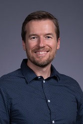 Headshot of Jon Singleton