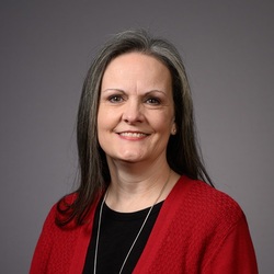 Headshot of Kari Aziamov