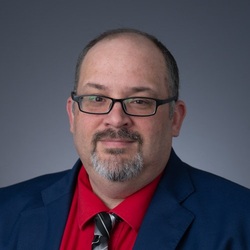 Headshot of Mark Brenneman