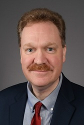 Headshot of Michael Claxton